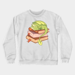 Little green dragon sleeping on a stack of books Crewneck Sweatshirt